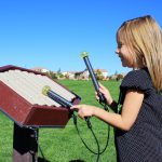 Rhythm - 9 note resonated marimba, fiberglass keys, recycled plastic frame, 2 mallets, recycled plastic post - In-Ground